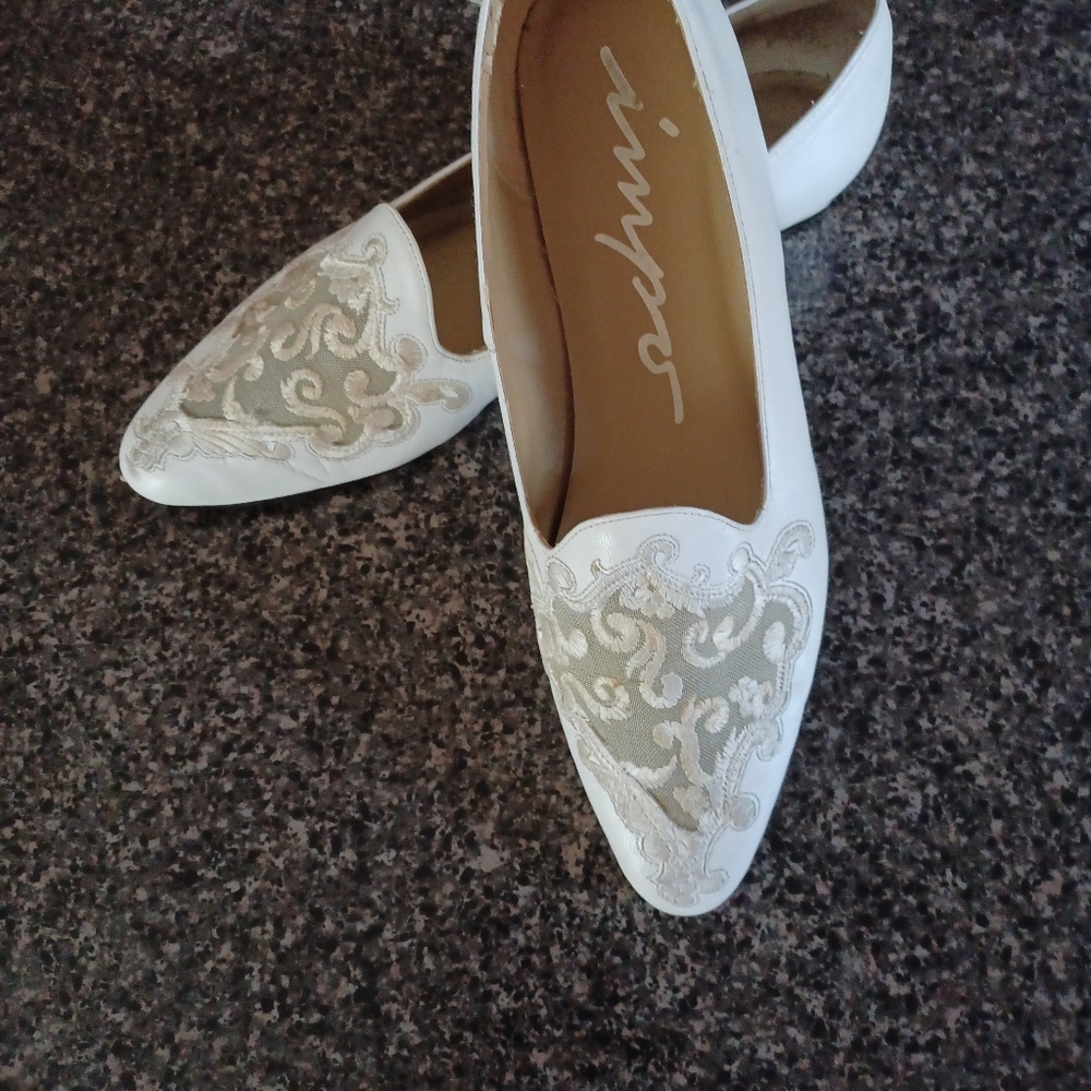 White low-heel Impo shoes
